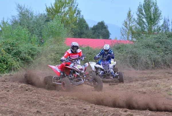 Unidentified racer rides a quad motorbike. — Stock Photo, Image