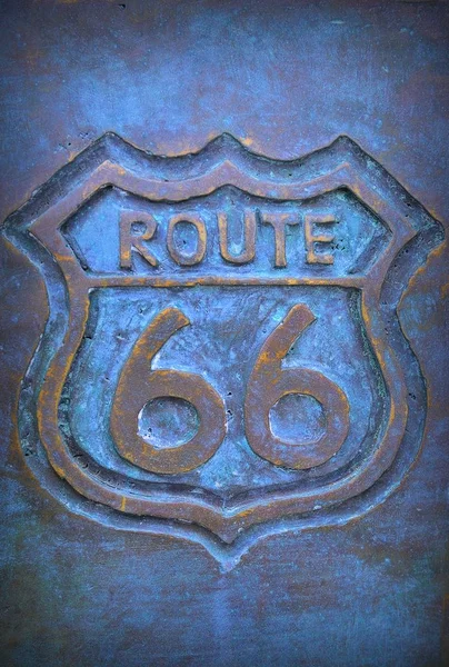 Old route 66 sign in bronze. — Stock Photo, Image