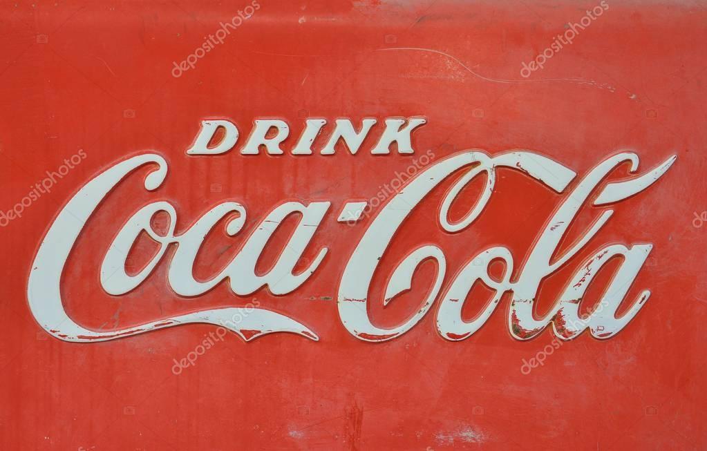 New Mexico, Usa - July 21, 2017: Sign of Coca-Cola painted in a rusty and old metal. Coca-Cola is a carbonated soft drink produced by The Coca-Cola Company.