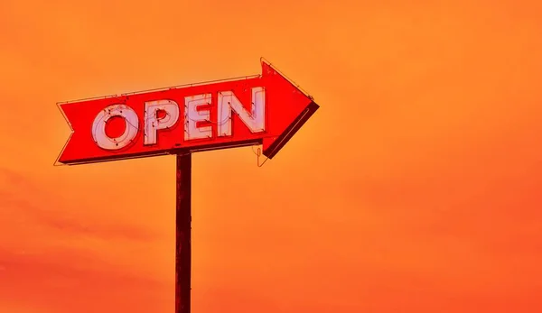 Open neon sign at sunset. — Stock Photo, Image