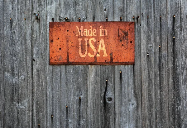 Roestige metalen bord met de zin: Made in Usa. Rechtenvrije Stockafbeeldingen
