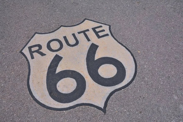 Route 66 sign in asphalt, USA. — Stock Photo, Image