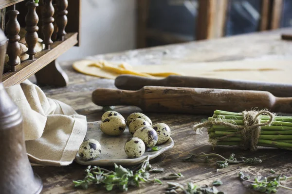 Ingredients for making homemade pasta, rolling pin, quail eggs — Stock Photo, Image