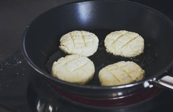 The cottage cheese pancakes fried in pan — Stock Photo, Image