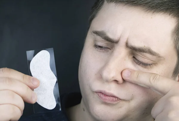 Man Puts Removes Strip Nose Black Dots Coal Cleaning Strips — Stock Photo, Image