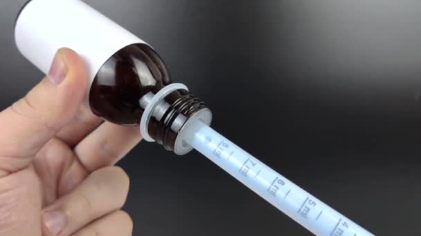 Liquid Antipyretic Collected Plastic Syringe Oral Use Macro Video Fever — Stock Video