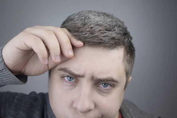 Trichologist Examines Young Mans Gray Hair Magnifying Glass Earlier Bleaching — Stock Photo, Image