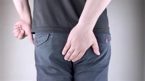 Man Holds His Hands Ass Feeling Pain Conversion Pain Rectum — Stok video