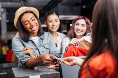 Young women shopping  clipart