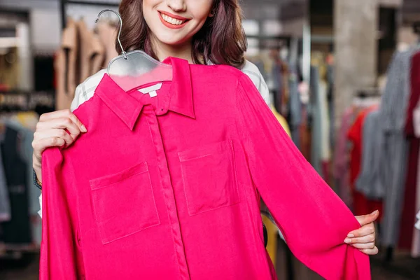 Hipster girl in boutique — Stock Photo