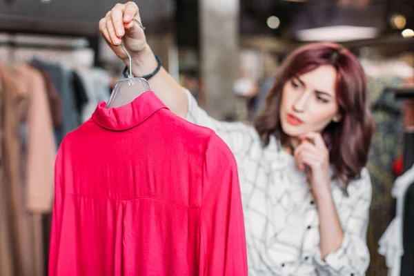 Hipster girl in boutique — Stock Photo