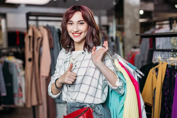 Hipster girl in boutique — Stock Photo