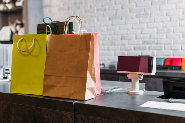 Shopping bags in boutique — Stock Photo