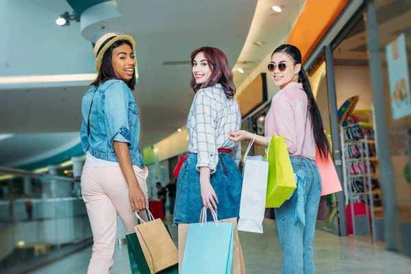 Young women with shopping bags — Stock Photo