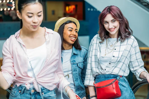 Young women in shopping mall — Stock Photo