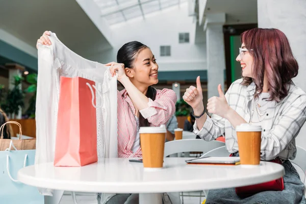 Young women in shopping mall — Stock Photo