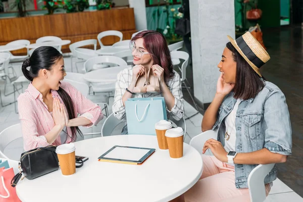 Young women in shopping mall — Stock Photo