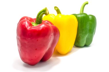Beyaz zemin üzerine sarı yeşil ve kırmızı çan peper.