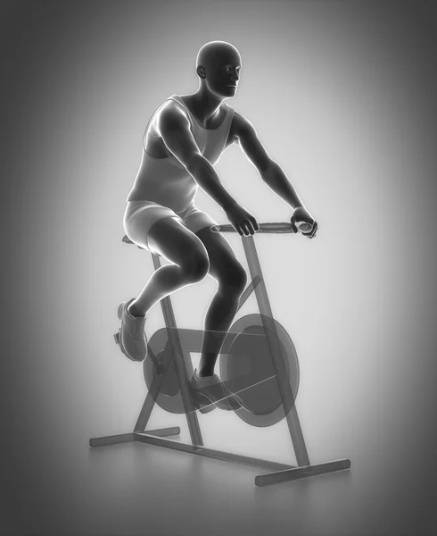 Homem exercitando-se na bicicleta ginásio — Fotografia de Stock