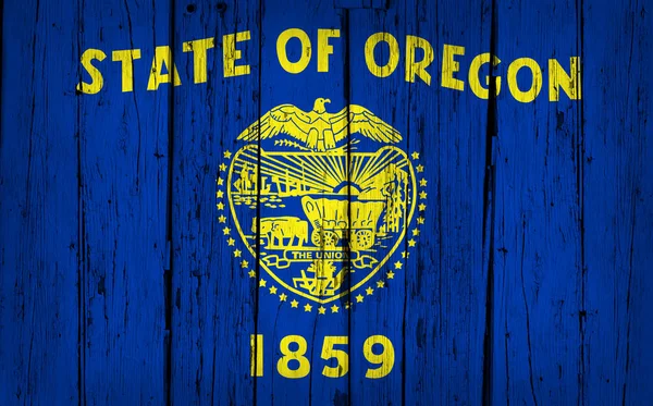 Oregon vlajky Grunge dřevěné pozadí — Stock fotografie