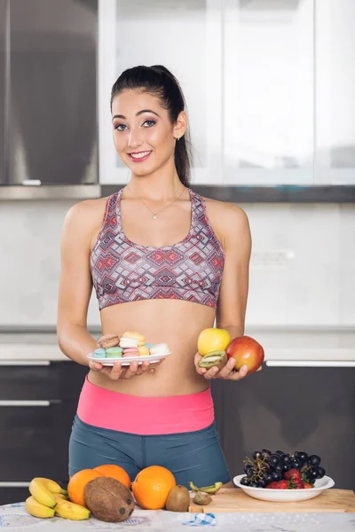 Young Fit Woman Kitchen Holding Two Plates Choosing What Eat — Stock Photo, Image