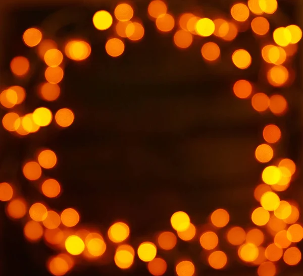 Fondo de madera con luces brillantes con un espacio libre para texto — Foto de Stock