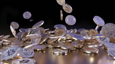 Bir yığının üstüne düşen Bitcoins