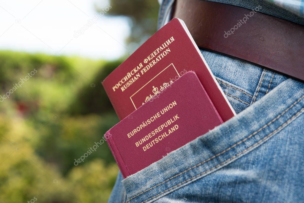  German and Russian passport in the pocket