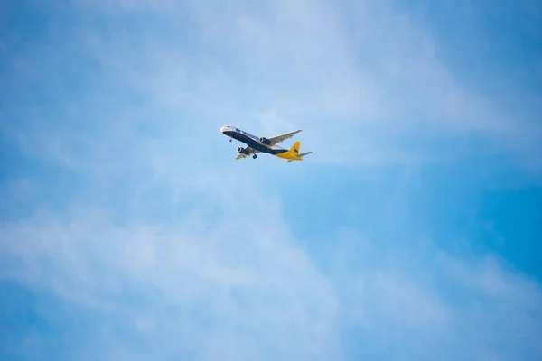 BARCELONA, SPAIN - AUGUST 20, 2016: Airplane Monarch Airbus 321 in the sky. The monarch is a British airline. Copy space for text. — Stock Photo, Image
