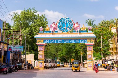 PUTTAPARTHI, ANDHRA PRADESH, INDIA - JULY 9, 2017: Arch-gates to the city. Copy space for text.                              clipart