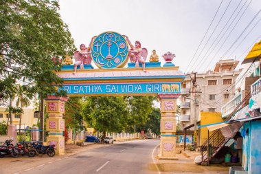 PUTTAPARTHI, ANDHRA PRADESH, INDIA - JULY 9, 2017: Arch-gates to the city. Copy space for text. clipart