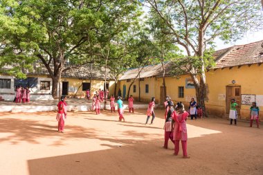 PUTTAPARTHI, ANDHRA PRADESH, INDIA - JULY 9, 2017: Group of indian schoolgirls. Copy space for text. clipart