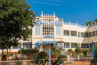 View of the indian building, Puttaparthi, Andhra Pradesh, India. Copy space for text.                     clipart