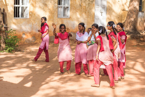 PUTTAPARTHI, ANDHRA PRADESH, INDIA - JULY 9, 2017: Group of indian schoolgirls. Copy space for text.