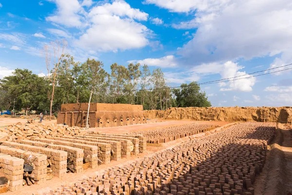 Production of indian bricks. The brick dries, Puttaparthi, Andhra Pradesh, India. Copy space for text. — Stock Photo, Image