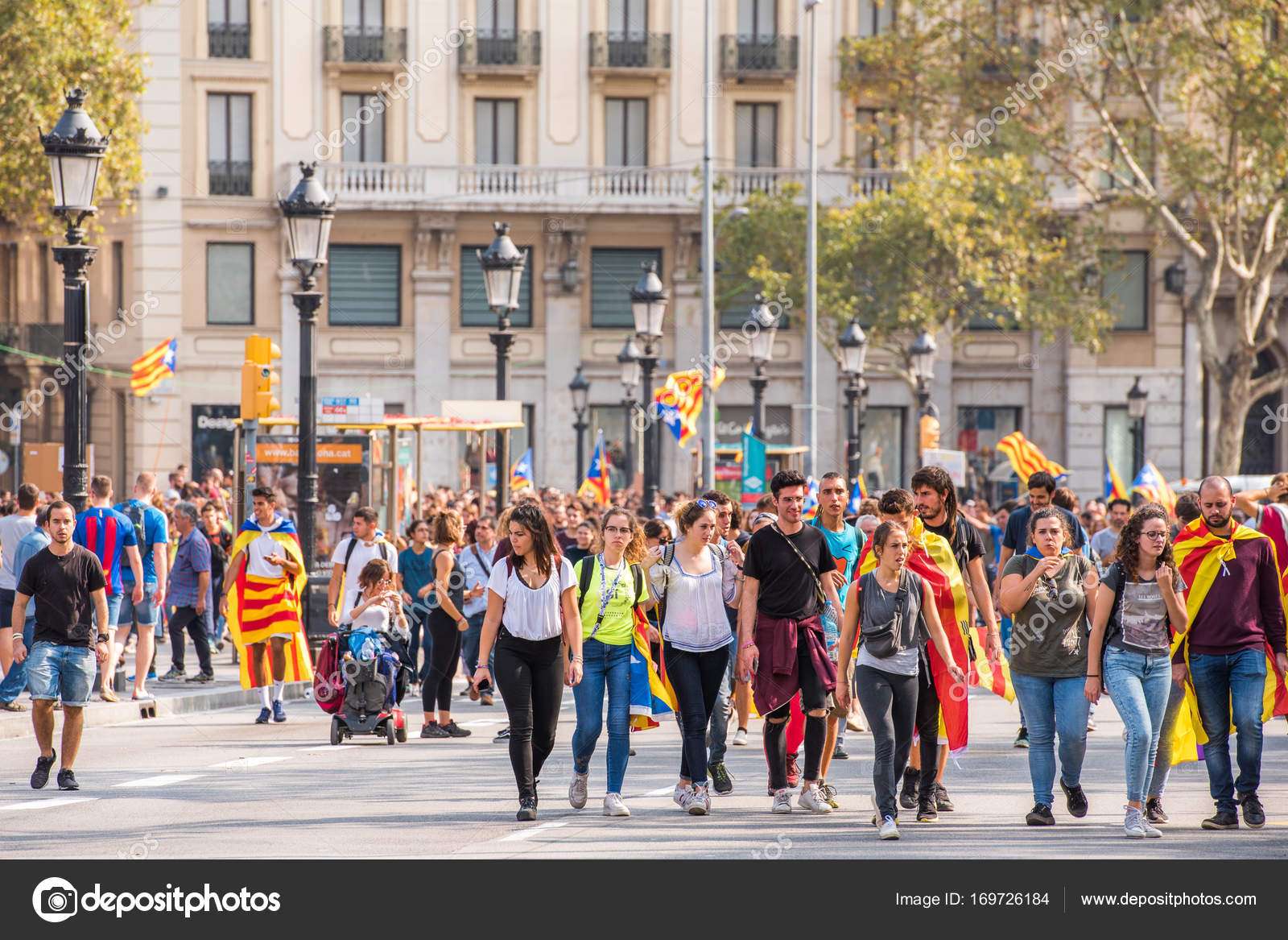 BARCELONA, SPAIN OCTOBER 3, 2017 Demonstrators bearing catalan flags