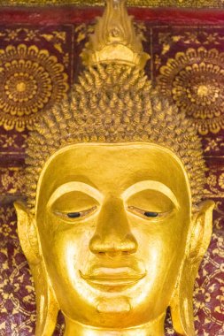Bir Budist Tanrı, Louangphabang, Laos heykeli. Yakın çekim. Dikey.