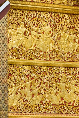 Louangphabang, Laos tapınakta duvar kısma. Yakın çekim. Dikey.