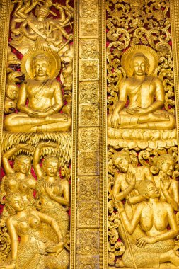Louangphabang, Laos tapınakta duvar kısma. Yakın çekim. Dikey.