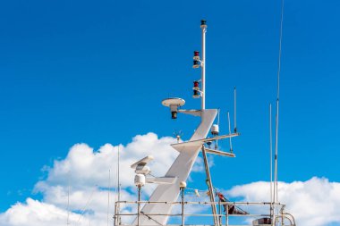 View of the yacht masthead against the blue sky, Sete, France. Copy space for text clipart
