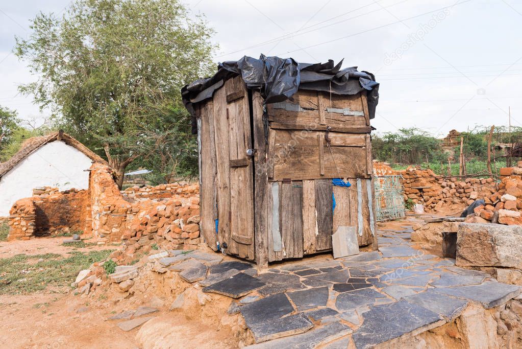 View of rural indian toilet, Puttaparthi, Andhra Pradesh, India. Copy space for text.