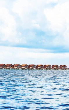 Tropikal Karayipler ada, Maldivler su Villa. Metin için yer kopyalayın. Dikey