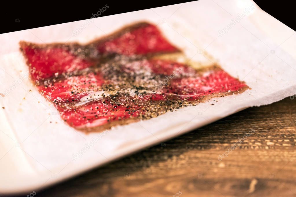 Japanese marbled meat (Kobe beef) on a plate, Tokyo, Japan. Close-up.