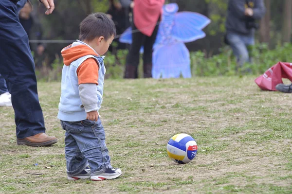 A baby playing football — Stock Photo, Image