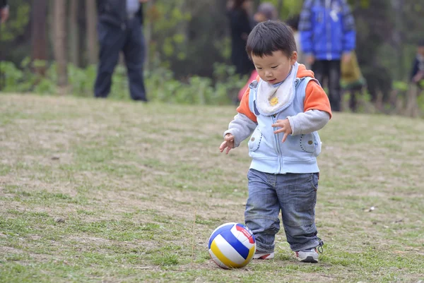 Baby playing football — Stock Photo, Image