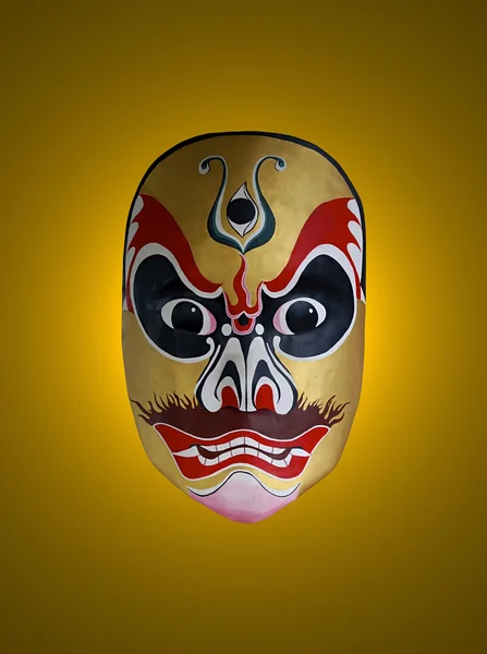 Masker van chinese opera met gouden geïsoleerde achtergrond — Stockfoto