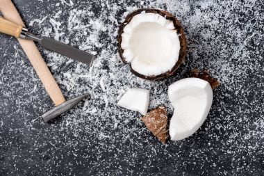 Cracked coconut with shavings  clipart