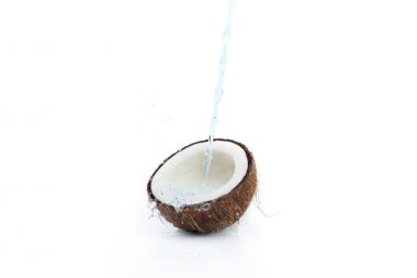 ripe tropical coconut with water clipart