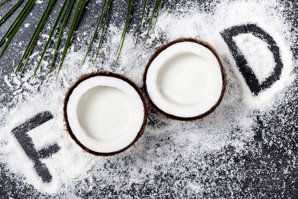 Halved coconut and shavings 