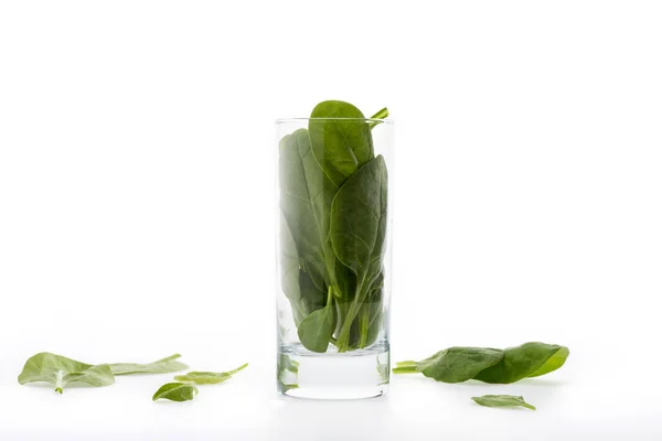 Spinach leaves in glass — Free Stock Photo